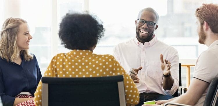 coworkers sitting and talking